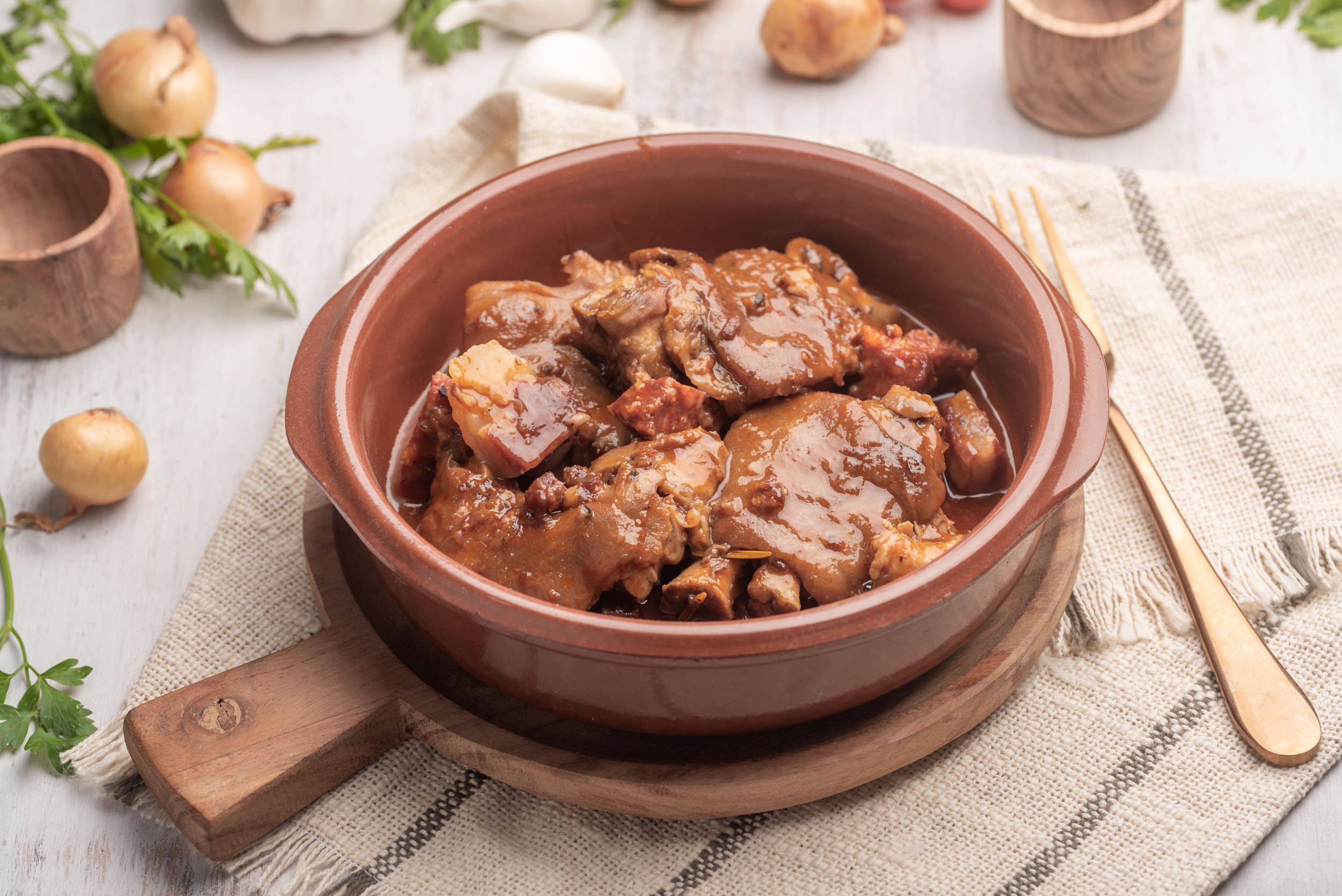 Manitas de cerdo guisadas